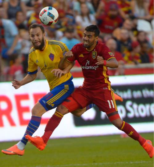 Leah Hogsten  |  The Salt Lake Tribune
Real Salt Lake midfielder Javier Morales (11) battles Colorado Rapids midfielder Shkelzen Gashi (11). Real Salt Lake defeated the Colorado Rapids 2-1 during their Rocky Mountain Championship Cup game at Rio Tinto Stadium Friday, August 26, 2016.