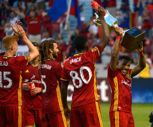 Leah Hogsten  |  The Salt Lake Tribune
Real Salt Lake forward Joao Plata (10) and Real Salt Lake players celebrate winning the Rocky Mountain Cup. Real Salt Lake defeated the Colorado Rapids 2-1 during their Rocky Mountain Championship Cup game at Rio Tinto Stadium Friday, August 26, 2016.