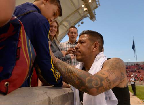 Leah Hogsten  |  The Salt Lake Tribune
Real Salt Lake goalkeeper Nick Rimando (18) signs autographs before leaving the field. Real Salt Lake defeated the Colorado Rapids 2-1 during their Rocky Mountain Championship Cup game at Rio Tinto Stadium Friday, August 26, 2016.