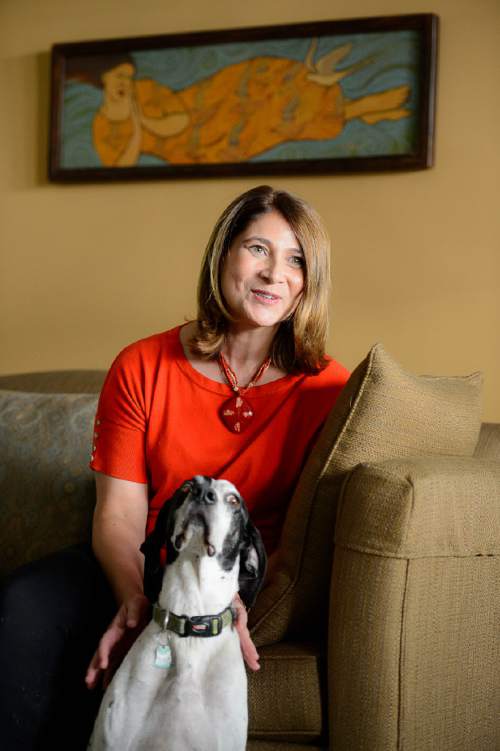 Trent Nelson  |  The Salt Lake Tribune
Jennifer Napier-Pearce has been named the new editor of The Salt Lake Tribune. She was photographed with her dog Sydney at her home in Salt Lake City, Thursday August 11, 2016.