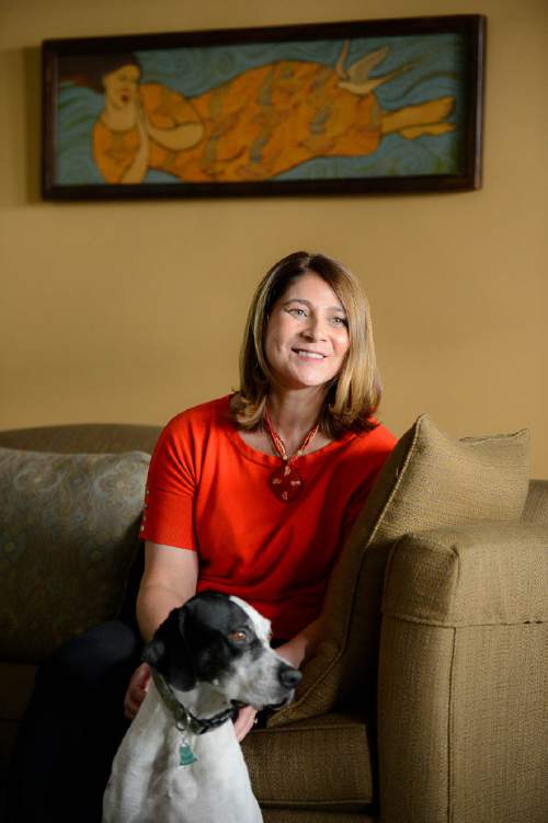Trent Nelson  |  The Salt Lake Tribune
Jennifer Napier-Pearce has been named the new editor of The Salt Lake Tribune. She was photographed with her dog Sydney at her home in Salt Lake City, Thursday August 11, 2016.