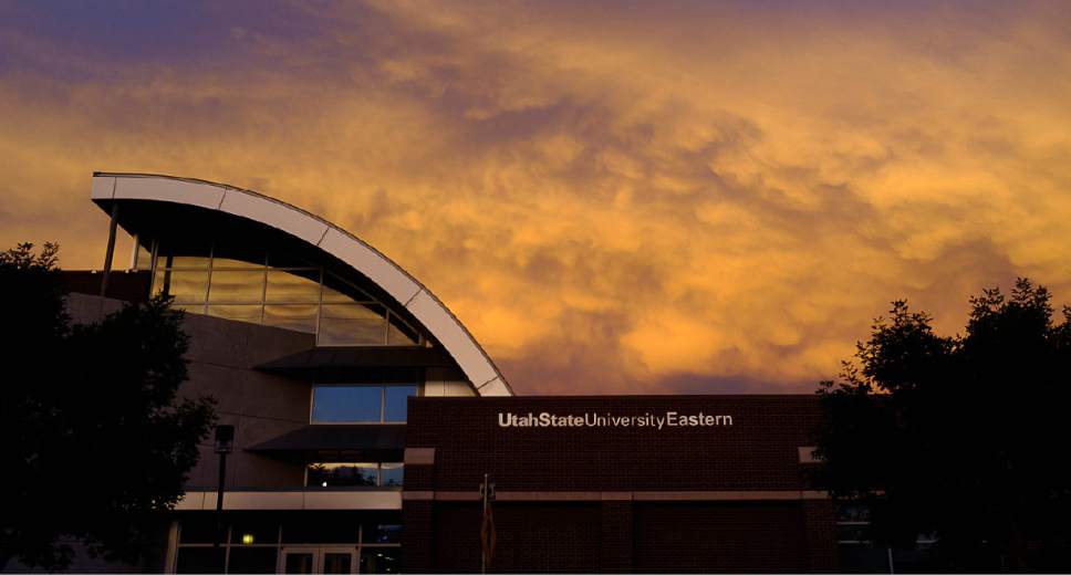 Trent Nelson  |  The Salt Lake Tribune
Sunset turns the clouds gold over the Jennifer Leavitt Student Center at Utah State University Eastern in Price, Tuesday August 23, 2016.