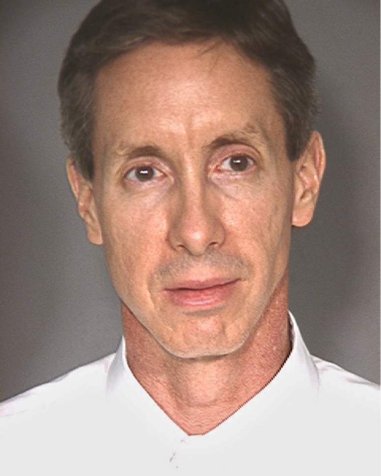 This image provided by the Las Vegas Metropolitan Police Department shows a booking photograph of Warren Jeffs after his arrest late Monday. Jeffs, who was on the FBI's Most Wanted List was found with cell phones, laptop computers, wigs and more than $50,000 in cash when he was arrested in Nevada, authorities said Tuesday Aug. 29, 2006.(AP Photo/Las Vegas Metropolitan Police Department)