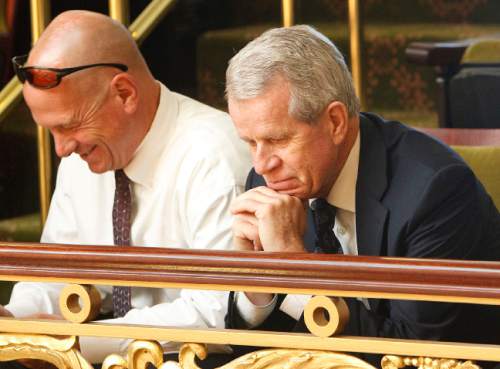 Leah Hogsten  |  The Salt Lake Tribune
 LDS Church lobbyist Bill Evans, right, and Utah liquor lobbyist Steve Barth, left, watch a Utah legislative session in 2012. Evans, now retired as a church lobbyist, is joining the board of Affirmation, a support group for LGBT Mormons and their families.