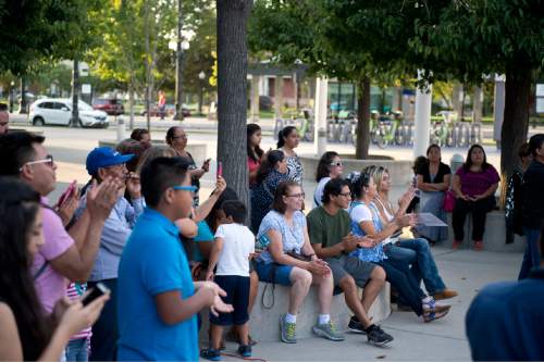Lennie Mahler  |  The Salt Lake Tribune

People listen to a performance of the music of Mexican singer-songwriter Juan Gabriel, who died of a heart attack Aug. 28. Telemundo 10 Utah hosted the vigil Monday, Aug. 29, 2016, in front of Vivint Smart Home Arena, where Gabriel was scheduled to perform Oct. 7.