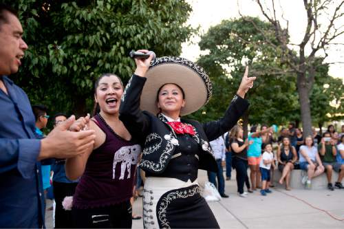 Lennie Mahler  |  The Salt Lake Tribune

Erika Kika dances to a performance of the music of Mexican singer-songwriter Juan Gabriel, who died of a heart attack Aug. 28. Telemundo 10 Utah hosted the event Monday, Aug. 29, 2016, in front of Vivint Smart Home Arena, where Gabriel was scheduled to perform Oct. 7.