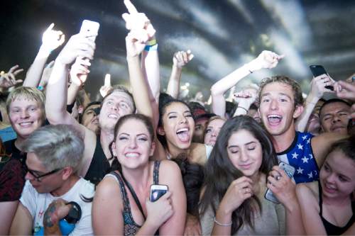 Lennie Mahler  |  The Salt Lake Tribune

Fans watch as Diplo performs in the Twilight Concert Series at Pioneer Park, Thursday, Aug. 4, 2016.