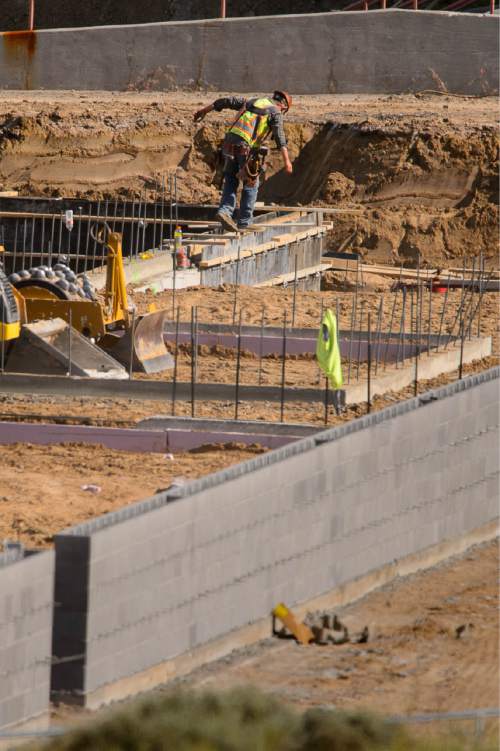 Trent Nelson  |  The Salt Lake Tribune
A worker from Phaze Concrete on the construction site of the new Rawlins High School in Rawlins, Wyoming, Tuesday June 30, 2015.