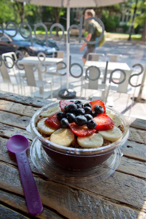 Lennie Mahler  |  The Salt Lake Tribune
Aubergine & Company's Brazilian Acai Bowl includes acai, banana and agave topped with granola, banana, strawberries and blueberries. Photographed at Aubergine at 2122 S. Highland Drive in Sugar House, Friday, Aug. 19, 2016.