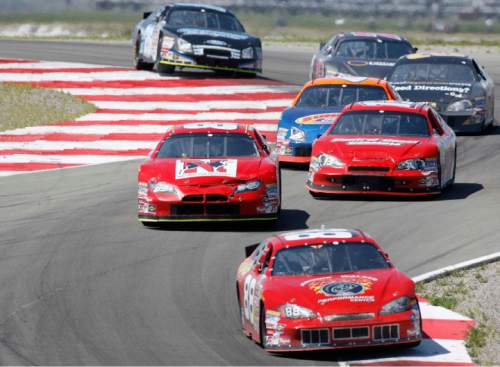 Trent Nelson  |  The Salt Lake Tribune
Cars race through "The Attitudes"  at the Nascar Camping World Series West last year at Miller Motorsports Park.
