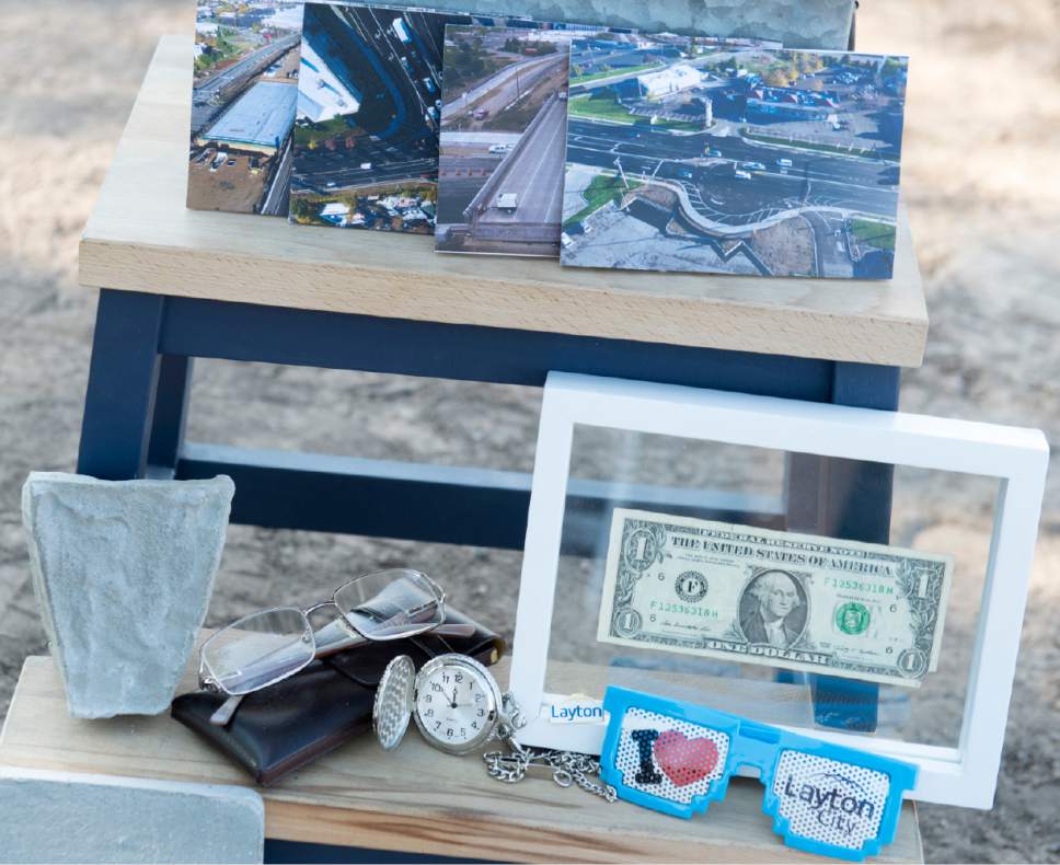 Rick Egan  |  The Salt Lake Tribune

Items to be placed in a time capsule, symbolizing partnerships behind the Hill Field road project. Wednesday, August 31, 2016.