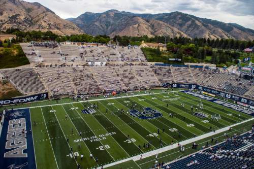 Chris Detrick  |  The Salt Lake Tribune
Utah State Aggies and Weber State Wildcats warm up before the game at Maverik Stadium Thursday September 1, 2016.