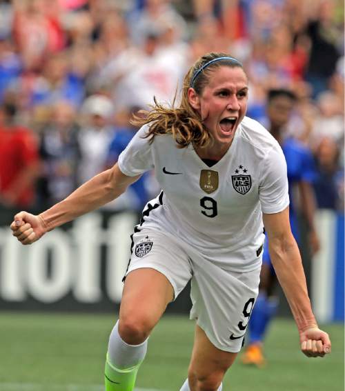 FILE - In this Sept. 20, 2015, file photo, United States midfielder Heather O'Reilly celebrates after scoring a goal against Haiti during the U.S. Women's World Cup soccer victory tour, in Birmingham, Ala. U.S. women's national team midfielder Heather O'Reilly has announced her retirement from international soccer after a 15-year run with the team.
O'Reilly will play her final international match with the team on Sept. 15 against Thailand in Columbus, Ohio. (Butch Dill/AL.com via AP, File)
