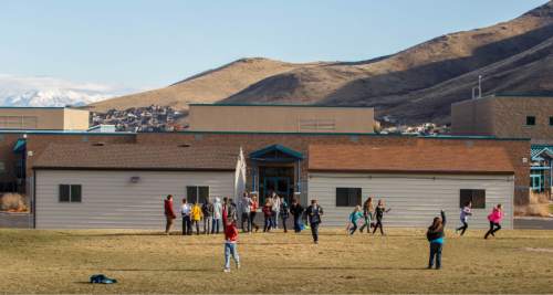 Trent Nelson  | Tribune file photo
In this 2013 photo, students play during recess at Butterfield Canyon Elementary in Herriman, which had 14 portable classrooms. Jordan School District voters that year rejected a $495 million bond that would have eased overcrowding, and the district is now trying again with a slimmer request.