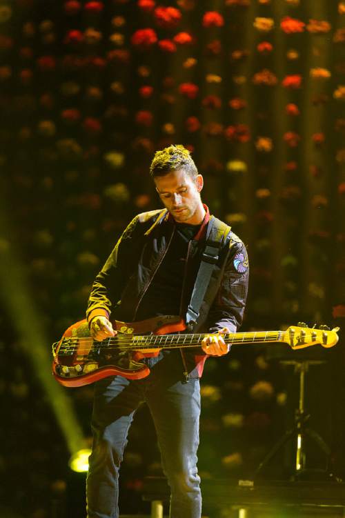 Trent Nelson  |  The Salt Lake Tribune
Coldplay bassist Guy Berryman performs at Vivint Smart Home Arena in Salt Lake City on Wednesday, Aug. 31, 2016.