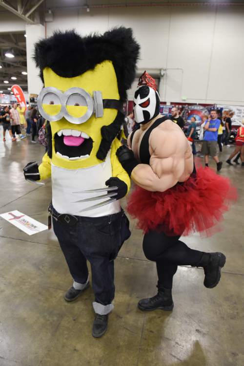 Francisco Kjolseth | The Salt Lake Tribune
Shawn Dillow of Boise, Idaho, as Wolver Minion has a run in with Ballerina Bane played by Kevin Scott of Salt Lake during day two of the 2016 Salt Lake Comic Con in Salt Lake City on Friday, Sept. 2, 2016.
