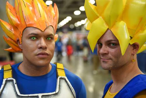 Francisco Kjolseth | The Salt Lake Tribune
Benjamin Jimenez of American Fork, left, and Nicholas Ridd of Riverton stand out as Vegeta and Vegito during day two of the 2016 Salt Lake Comic Con in Salt Lake City on Friday, Sept. 2, 2016.