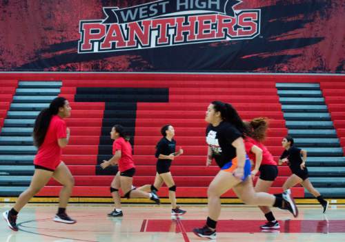 Steve Griffin / The Salt Lake Tribune

The West High School volleyball players run conditioning drills at the end of practice at West High School in Salt Lake City Friday September 2, 2016.