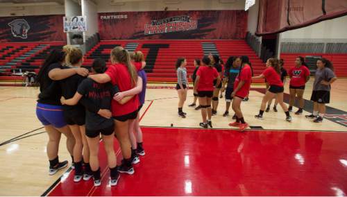 Steve Griffin / The Salt Lake Tribune

The West High School volleyball team huddle together as they prepare to run conditioning drills at the end of practice at West High School in Salt Lake City Friday September 2, 2016.