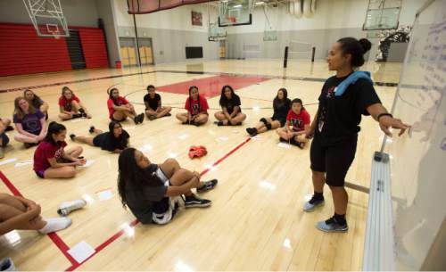 Steve Griffin / The Salt Lake Tribune

Keano Maumau, West High assistant volleyball coach, works with the West players emphasizing teamwork and responsibility at the end of practice at West High School in Salt Lake City Friday September 2, 2016.