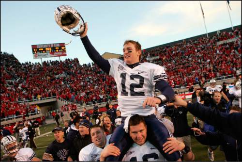 Trent Nelson  |  The Salt Lake Tribune
BYU quarterback John Beck is carried off the field after the comeback win over Utah in 2006.