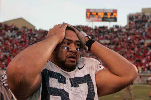 Trent Nelson  |  The Salt Lake Tribune
BYU's Sete Aulai in disbelief after BYU's comeback win over Utah in 2006.