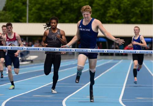 Scott Sommerdorf   |  The Salt Lake Tribune  
Hunter Woodhall of Syracuse won the boy's 5A 400M with a time of 47.63 at the second day of the state high school track & field meet at BYU, Saturday, May 21, 2016.