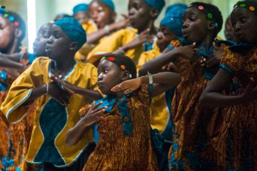 Chris Detrick  |  The Salt Lake Tribune
The African Children's Choir performs at Cottonwood Presbyterian Church Sunday September 4, 2016. The program featured well-loved children's songs, traditional
Spirituals and Gospel favorites. Music for Life (The parent organization for The African Children's Choir) works in seven African countries such as, Uganda, Kenya, Rwanda, Sudan, Nigeria, Ghana and South Africa. Music for Life has educated over 52,000 children and impacted the lives of over 100,000 people through its relief and development programs during its history. 
The African Children's Choir has had the privilege to perform before presidents, heads of state and most recently the Queen of England, Queen Elizabeth II, for her diamond jubilee. The Choir has also had
the honor of singing alongside artists such as Paul McCartney, Annie Lennox, Keith Urban, Mariah Carey, Michael W. Smith, and other performers.