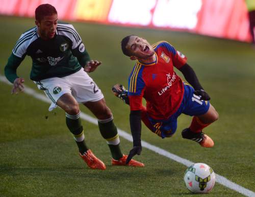 Steve Griffin  |  The Salt Lake Tribune

Real Monarchs midfielder Ricardo Velazco gets tripped up by Portland Timbers 2 defender Taylor Peay at Rio Tinto Stadium in Sandy, Wednesday, April 8, 2015.