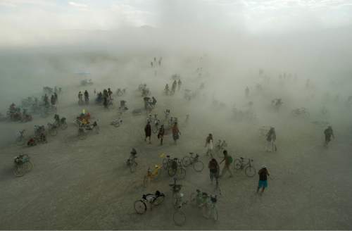 Rick Egan  |  The Salt Lake Tribune

Dust blows over the playa, at the Burning Man Festival,in the Black Rock Desert, 100 miles north of Reno, NV, Friday, September 2, 2016.
