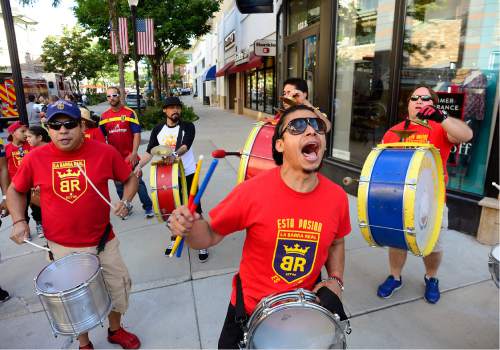 Scott Sommerdorf   |  The Salt Lake Tribune  
"La Barra" the drum corps seen at Real Salt Lake games warms up prior to the first Annual Hispanic Heritage Parade & Street Festival at The Gateway, Saturday, September 3, 2016.