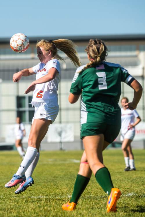 Chris Detrick  |  The Salt Lake Tribune
Brighton's Bella Gleeson (6) heads the ball past Copper Hills' Dominique Estrada (10) during the game at Brighton High school Tuesday September 6, 2016. Copper Hills won the game 2-0.