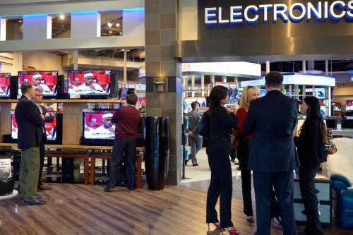 Chris Detrick  |  The Salt Lake Tribune
Customers shop during the grand opening of a RC Willey store in Draper Wednesday April 23, 2014.