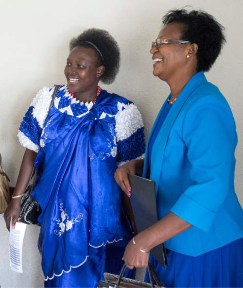 Rick Egan  |  The Salt Lake Tribune

Specy Namimana and Esperance Rugomwa visit between meetings at the Parleys Creek Swahili LDS Branch on Sunday, June 12, 2016.