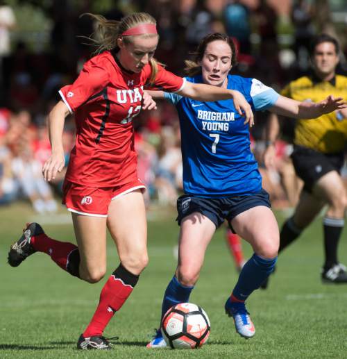 Rick Egan  |  The Salt Lake Tribune

Holly Daugirda (12) Utah, goes for the ball along with Michele Vasconcelos (7) BYU, in soccer action, BYU vs. Utah, at the Ute soccer field, Monday, September 5, 2016.
