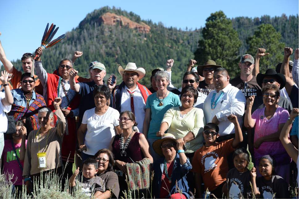 Scott Sommerdorf   |  The Salt Lake Tribune  
With one of the Bears Ears in the background, U.S. Interior Secretary Sally Jewell poses with a large group of native people who support the creation of the Bears Ears National Monument, after a long meeting under a tent in a meadow atop the Bears Ears, Friday, July 15, 2016. The event included native dances and songs along with speeches from native people about how they are spiritually and culturally connected to the Bears Ears region.