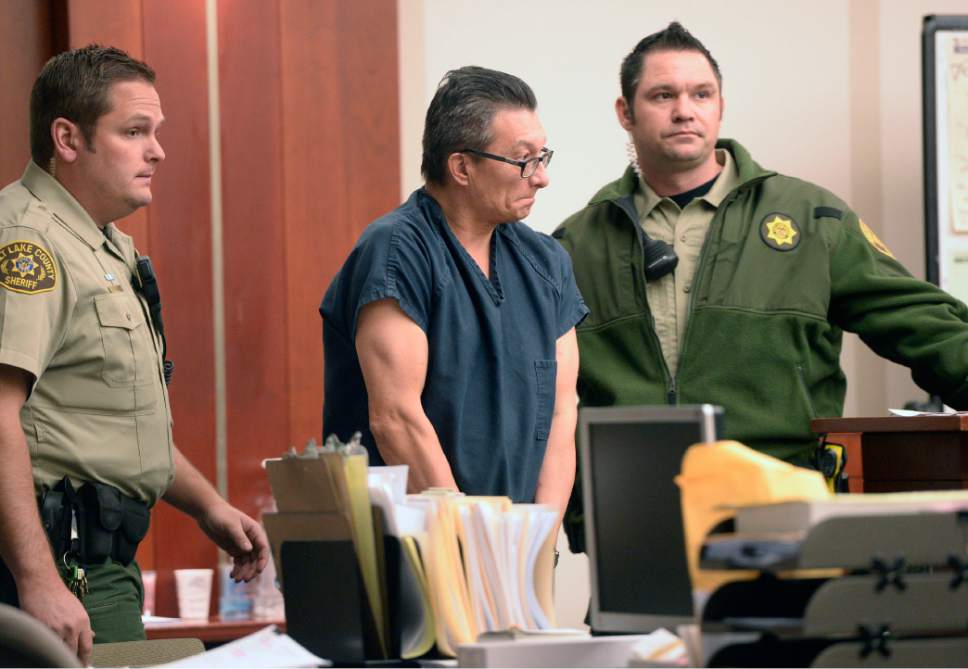 Al Hartmann  |  The Salt Lake Tribune
Baliffs escort Larry Kent Graff, center,  for his initial appearance Tuesday Dec. 30 in Judge Bruce Lubeck's court. Graff is charged with killing 26-year-old Candice Christina Melo on Dec. 18 in the driveway of Graff's Sandy home. Melo had been living at the home for about a week prior to the fatal episode.