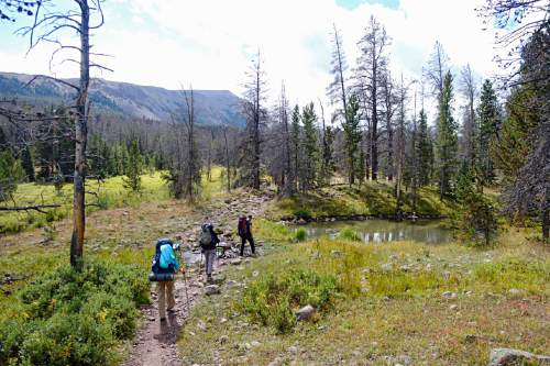 Lennie Mahler  |  The Salt Lake Tribune

Cindy Bird Vance, Amanda Wagner and Peter Wagner hike along Henrys Fork Trail toward Kings Peak in the Uinta Mountains. Monday, Sept. 5, 2016.
