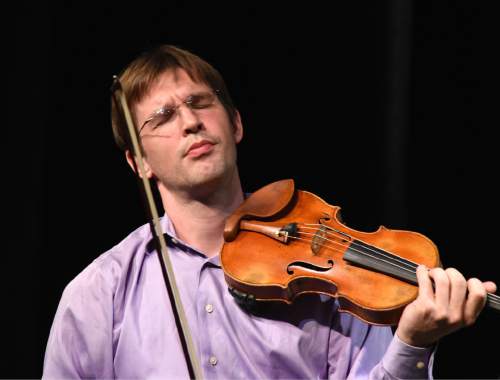 Lynn R. Johnson  |  Special to The Salt Lake Tribune

New York violinist Jesse Mills performed Sonata for Violin and Piano by Enrique Granados during the Spanish Gold concert Friday, Sept. 2, 2016, at Moab's historic Star Hall. The performance was part of the 2016 Moab Music Festival, which continues through Sept. 12 in various locations.