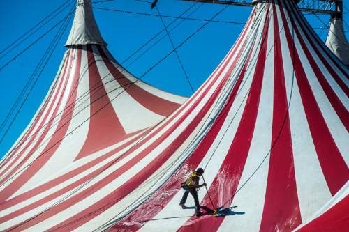 Chris Detrick  |  The Salt Lake Tribune
Ruden Caballer washes the top of the Big Top Circus Spectacular at the Utah State Fairpark Wednesday September 7, 2016. The Utah State Fair runs September 8 ñ 18 at the Utah State Fairpark.