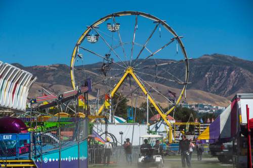 Chris Detrick  |  The Salt Lake Tribune
Workers set up at the Utah State Fairpark Wednesday September 7, 2016. The Utah State Fair runs September 8 – 18 at the Utah State Fairpark.