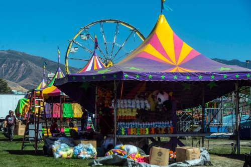 Chris Detrick  |  The Salt Lake Tribune
Workers set up at the Utah State Fairpark Wednesday September 7, 2016. The Utah State Fair runs September 8 – 18 at the Utah State Fairpark.