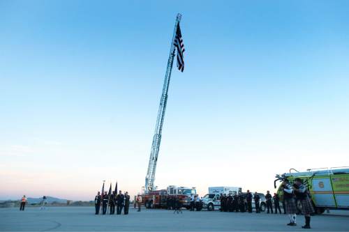 Rick Egan  |  The Salt Lake Tribune

Veterans of Foreign Wars present the colors as workers for the Salt Lake Airport rebuild project gather for a  9/11 remembrance ceremony honoring first responders, at the Salt Lake Airport, Friday, September 9, 2016.