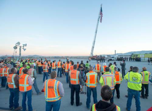 Rick Egan  |  The Salt Lake Tribune

Workers for the Salt Lake Airport rebuild project gather for a  9/11 remembrance ceremony honoring first responders, at the Salt Lake Airport, Friday, September 9, 2016.