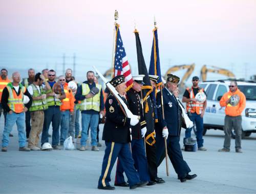 Rick Egan  |  The Salt Lake Tribune

Veterans of Foreign Wars present the colors as workers for the Salt Lake Airport rebuild project gather for a  9/11 remembrance ceremony honoring first responders, at Salt Lake City International Airport, Friday, September 9, 2016.