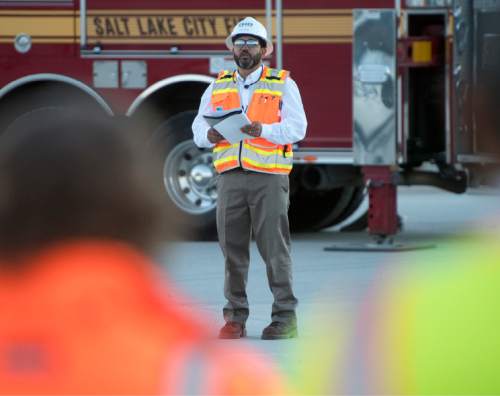 Rick Egan  |  The Salt Lake Tribune

 Angel Medina speaks during the 9/11 remembrance ceremony honoring first responders, at the Salt Lake Airport, Friday, September 9, 2016.