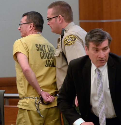 Al Hartmann  |  The Salt Lake Tribune 
Larry Graff, 52, charged with first-degree felony murder in the fatal shooting of 26-year-old Candice Christina Melo, is escorted by a bailiff during a preliminary hearing in 3rd District Court in West Jordan Wednesday April 8, 2015. His defense lawyer Greg Skordas, is at right.
