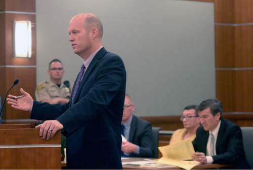 Al Hartmann  |  The Salt Lake Tribune 
Prosecutor Tyson Hamilton questions a witness in a preliminary hearing for Larry Graff, 52, charged with first-degree felony murder in the fatal shooting of 26-year-old Candice Christina Melo, in 3rd District Court in West Jordan Wednesday April 8, 2015.