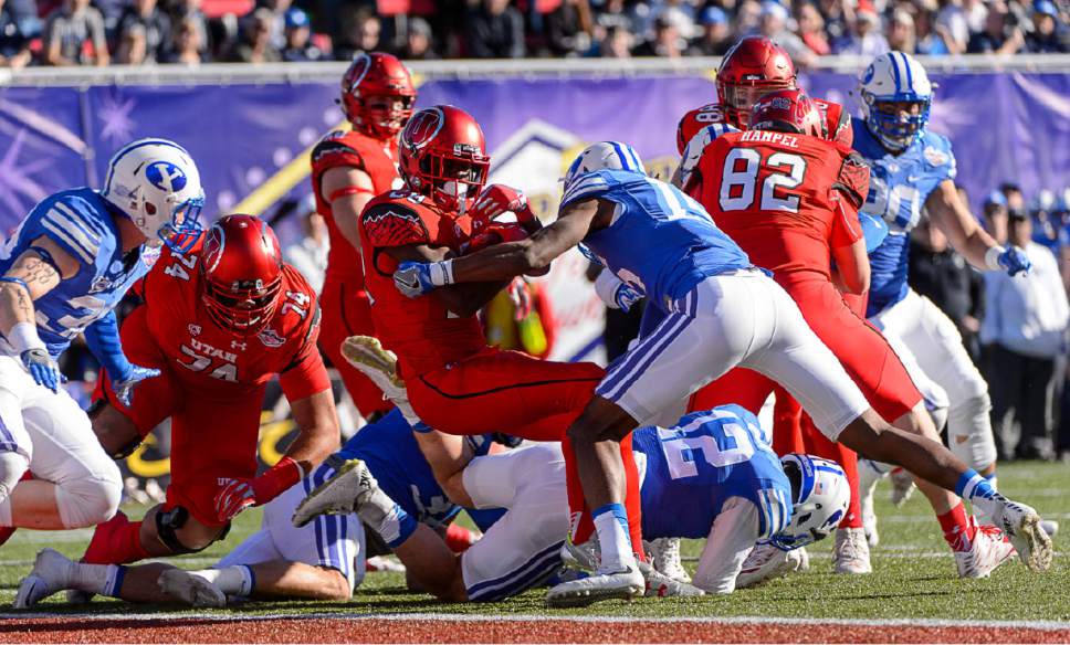 Trent Nelson  |  The Salt Lake Tribune
Utah Utes running back Joe Williams (28) scores a touchdown as Utah faces BYU in the Royal Purple Las Vegas Bowl, NCAA football at Sam Boyd Stadium in Las Vegas, Saturday December 19, 2015.