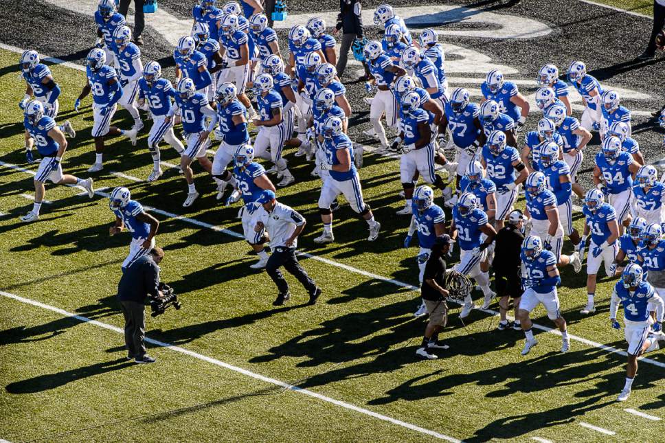 Trent Nelson  |  The Salt Lake Tribune
BYU warms up before kickoff as Utah faces BYU in the Royal Purple Las Vegas Bowl, NCAA football at Sam Boyd Stadium in Las Vegas, Saturday December 19, 2015.